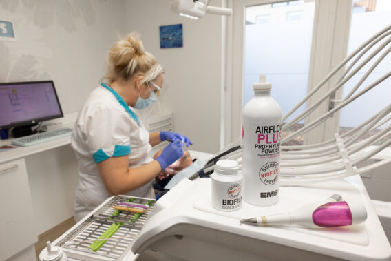 Photo of patient being treated in the treatment chair at Tanrarts Dental Clinics